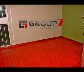 Bedroom 2 with wooden flooring