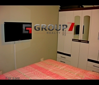 Bedroom 1 with built-in cupboards