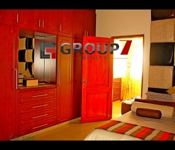 Bedroom 1 with built-in cupboards