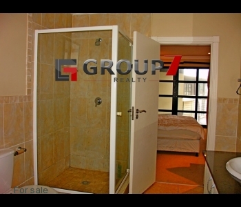 Bedroom 1 en-suite bathroom with shower cubicle