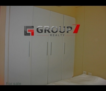 Bedroom with built-in cupboards
