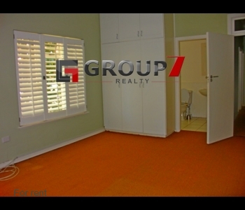 Bedroom 1 with built-in cupboards and en-suite bathroom