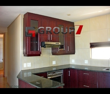 Kitchen with oven, hob and extractor