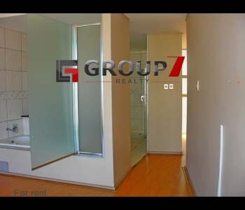 Bedroom 1 with en-suite bathroom and laminate floors