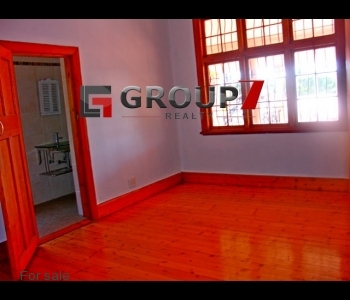 Bedroom 3 with gleaming wooden floors and en-suite bathroom