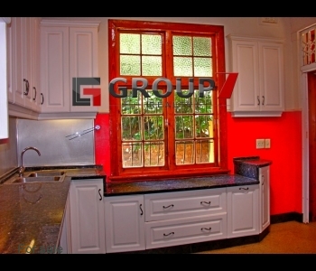 Spacious kitchen with granite tops