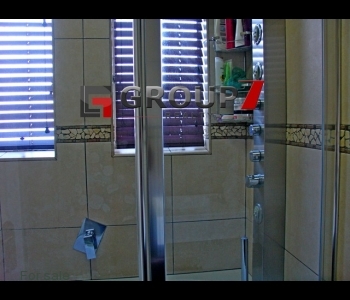 Bathroom with massage shower jets and cubicle