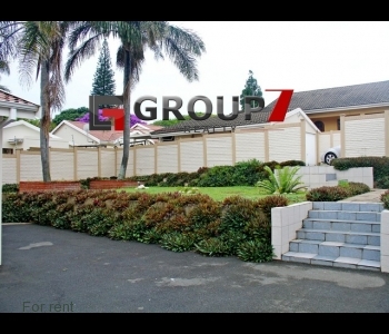 Beautiful landscaped garden with lock up garage on the top