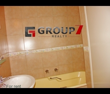 Bathroom 2 neatly tiled with tub