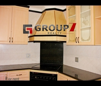 Kitchen with defy oven, hob and extractor