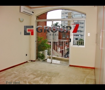 Bedroom 2 carpeted with BIC and balcony