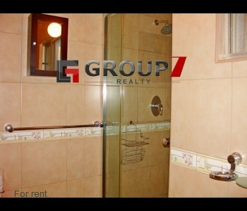 Bathroom 2 neatly tiled with shower