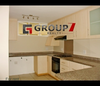 Kitchen with oven, hob and extractor