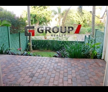 Patio with landscaped garden