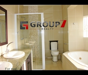 Bathroom with shower and bathtub