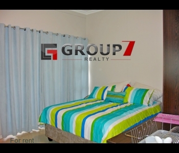 Bedroom porcelain tiled with double bed included