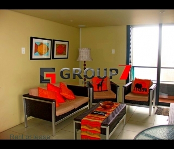 Lounge with double volume windows for great views