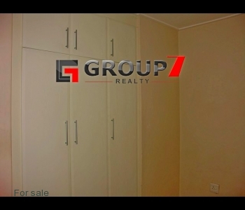 Bedroom with built-in cupboards