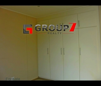 Bedroom with built-in cupboards