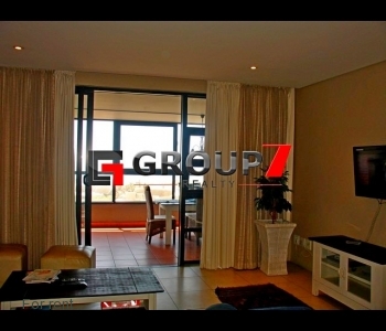 Lounge leading onto balcony