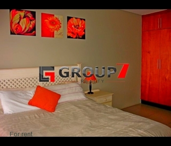 Bedroom with built-in cupboards