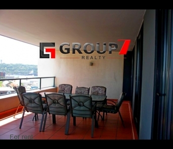 Balcony with dining and braai area