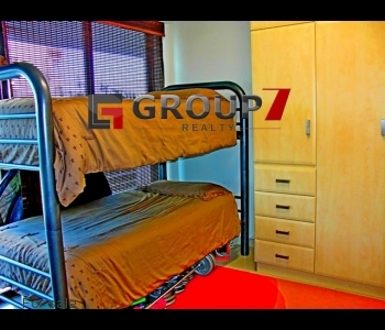 Bedroom 2 with built-in cupboards