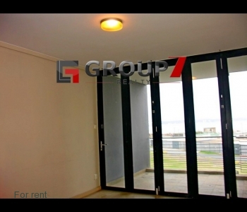 Lounge with floor to ceiling windows to enjoy the seaviews