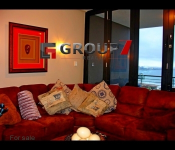 Lounge with floor to ceiling windows for amazing sea views