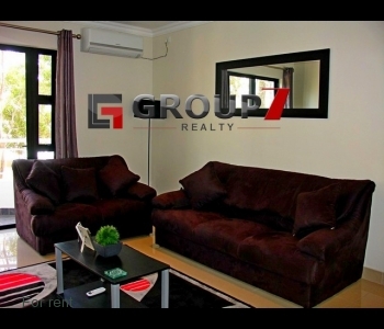 Lounge with porcelain tiles and
aircon