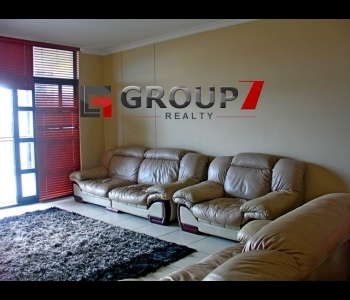 Lounge with double volume windows