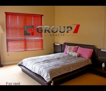 Bedroom 1 which is carpeted