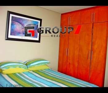 Bedroom 2 with built-in cupboards