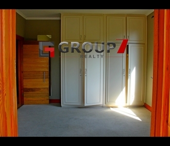 Spacious bedroom is fully carpeted  
with built-in cupboards